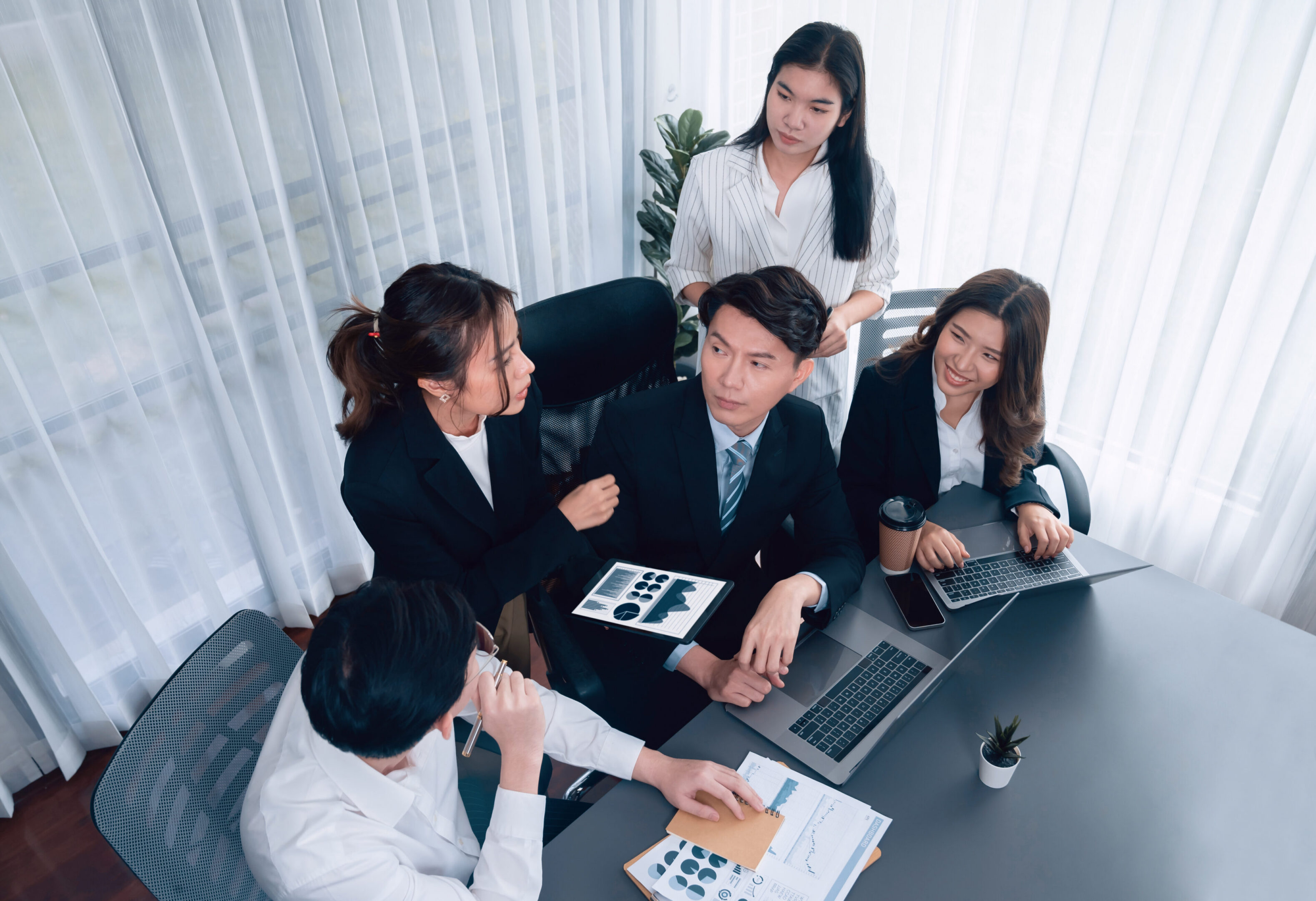 Colleagues discussing in a modern office